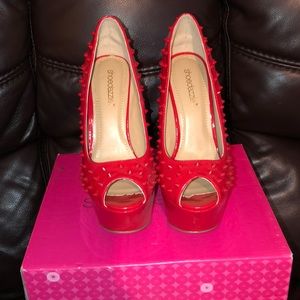 Red platform shoes